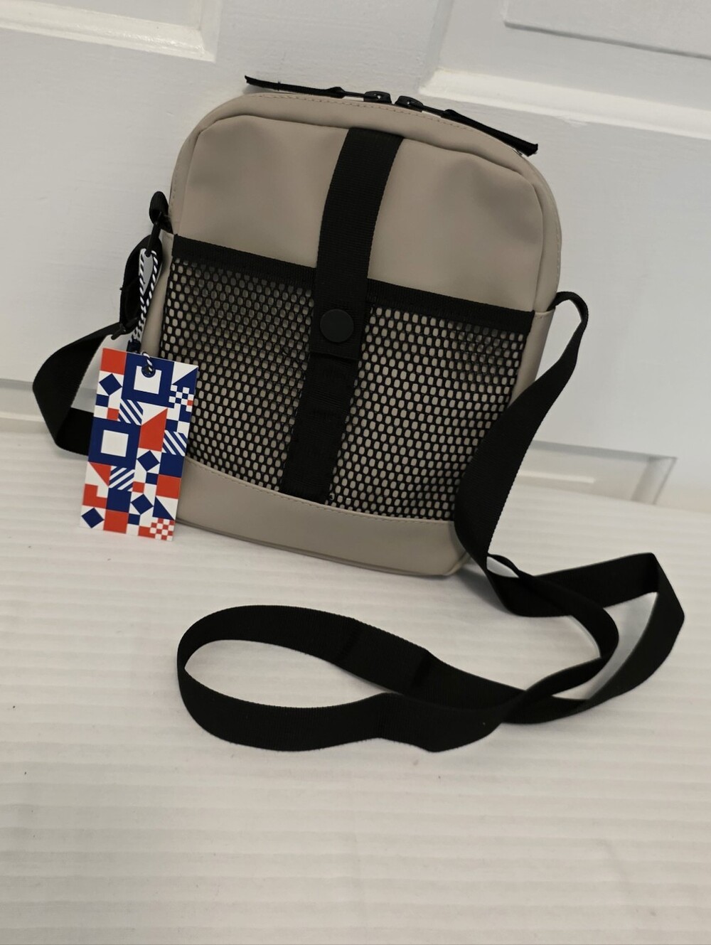 NWT Batela Sea Style Beige Crossbody Bag with Black Mesh Detail